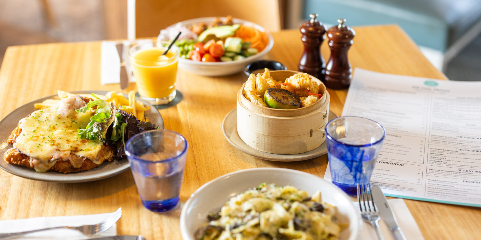 Table set with breakfast food at a table